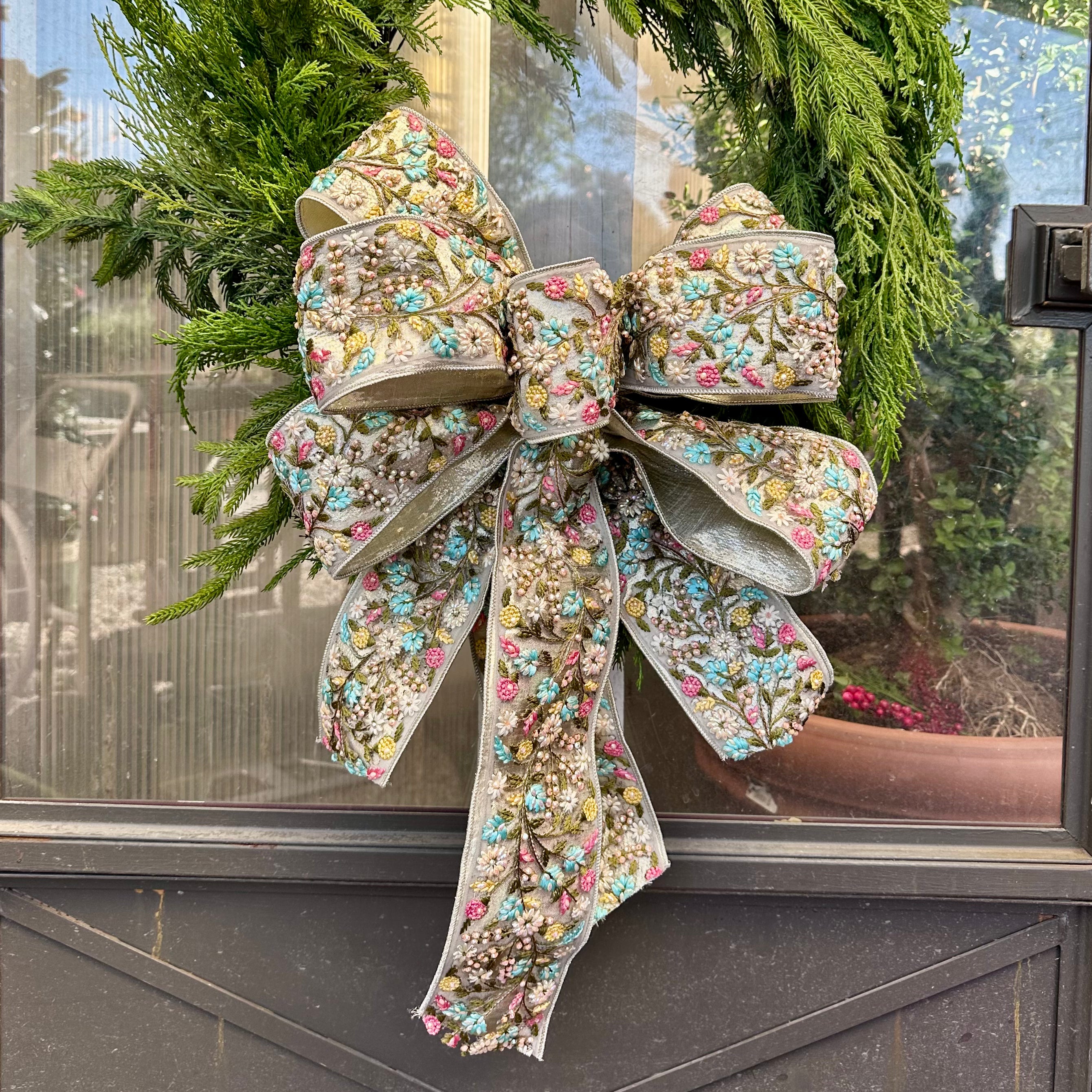 HAND-TIED BEADED APPLIQUE BOW